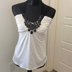 Cache halter top with attached necklace.